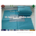 Disposable surgical gown and surgical drape, sterile pack